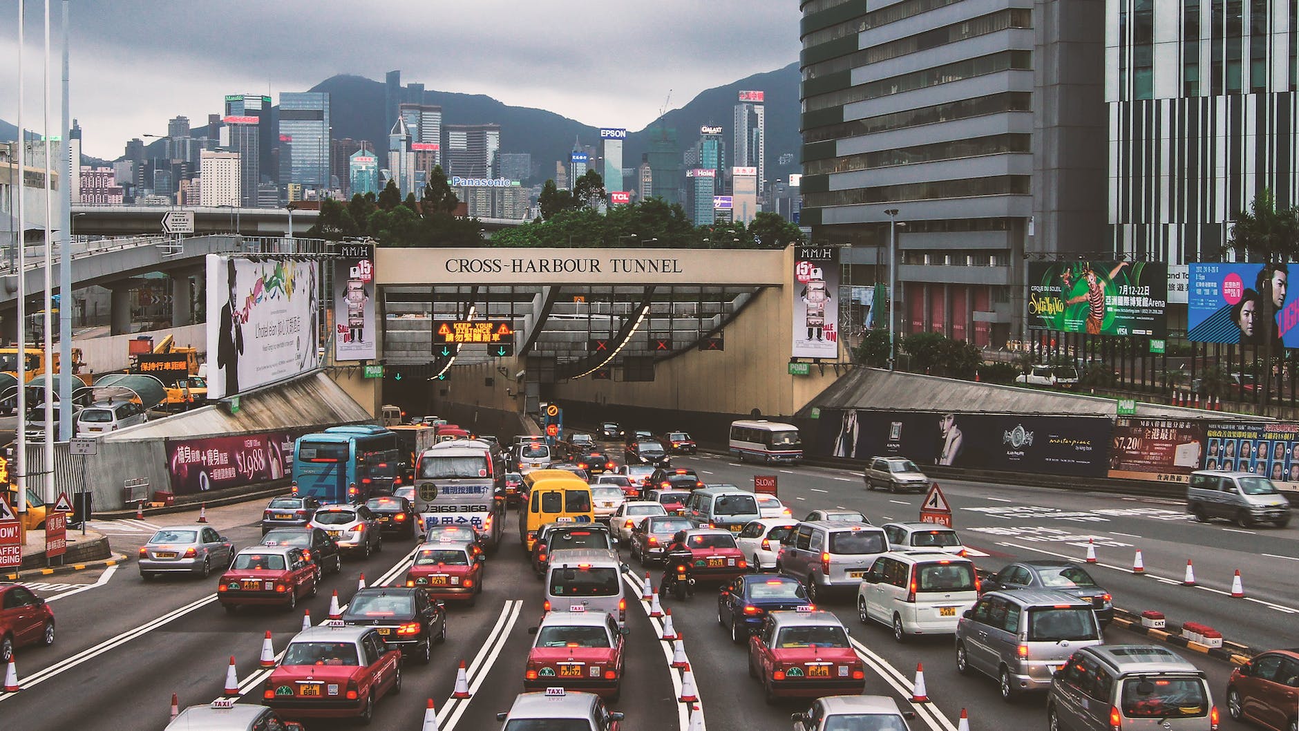 buildings cars city cross harbour tunnel